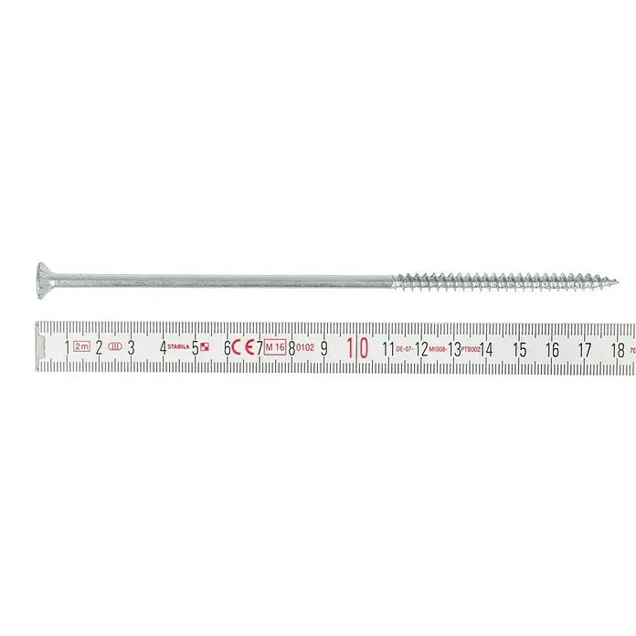 Profi Depot Spanplattenschraube VZ - Ø x L: 6 x 180 mm, 50 Stk., Verzinkt - Nahaufnahme einer langen, silberfarbenen Holzschraube, die vor einem Zentimetermaßstab liegt, der die Länge der Schraube anzeigt.