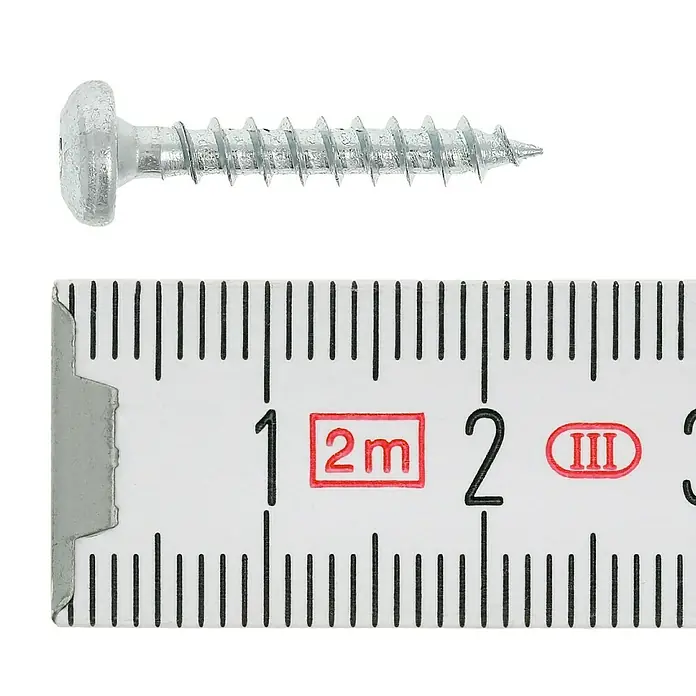 Profi Depot Spanplattenschraube VZ - 3,5 x 20 mm, 200 Stk., Verzinkt, TX für TORX-Antriebe - Nahaufnahme einer silberfarbenen Senkkopfschraube neben einem weißen Messlineal zur Größenanzeige.