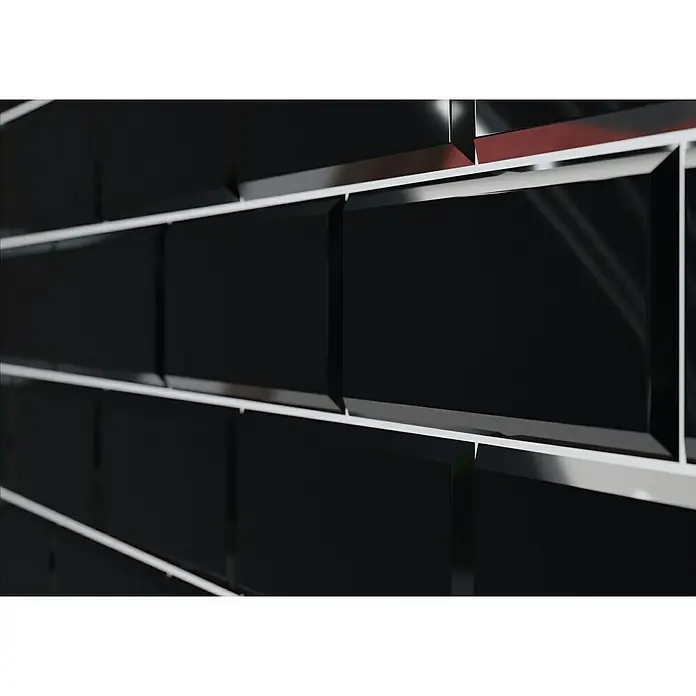 Modern Style Wandfliese Manhattan Biselado Negro - 7,5 x 30 cm, Schwarz, Glänzend - Nahaufnahme von glänzenden, schwarzen Metrofliesen mit weißen Fugen. Die Fliesen sind rechteckig und versetzt angeordnet.