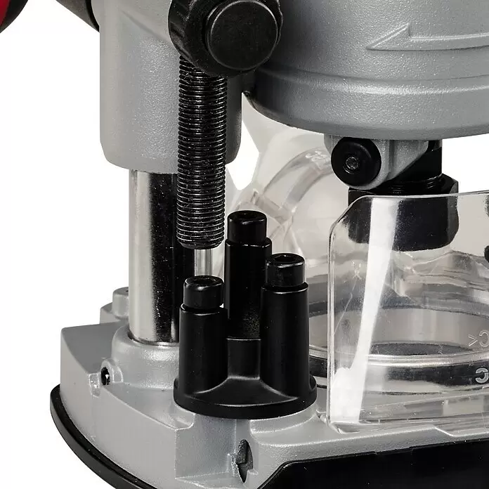 Einhell Professional PXC 18V Fresadora combinada de batería TP-RO 18 Set Li BL - 18 V, Sin batería - Primer plano de la base gris de una fresadora, mostrando componentes negros de ajuste de profundidad y protección transparente.