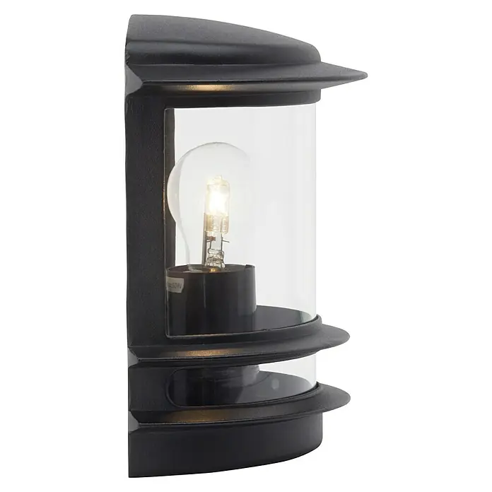 Brilliant Außenwandleuchte Hollywood - 60 W, 13 x 23,5 x 24 cm, Schwarz, IP44 - Nahaufnahme einer schwarzen Außenwandleuchte mit einer klaren, zylindrischen Glasscheibe, die eine Glühbirne zeigt.