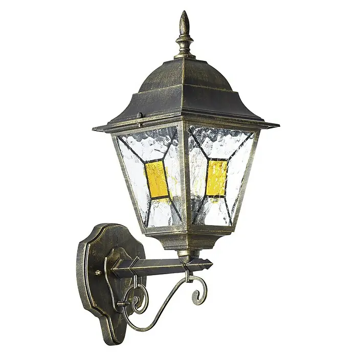 Brilliant Janel Außenwandleuchte - 20 W, 25,5 x 18 x 44,5 cm, Schwarz gold, IP44, Stehend - Nahaufnahme einer goldenen Wandleuchte im Außenbereich mit gemustertem Glas und dekorativen Akzenten.