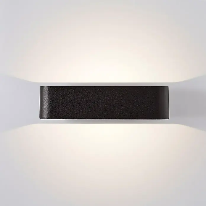 Brilliant LED-Außenwandleuchte Golda - 7 W, 13,1 x 22 x 5,5 cm, Schwarz, IP54 - Moderne schwarze Wandleuchte für Innenräume, die ein sanftes, indirektes Licht nach oben und unten abgibt. Perfekt für Flure oder Wohnzimmer.