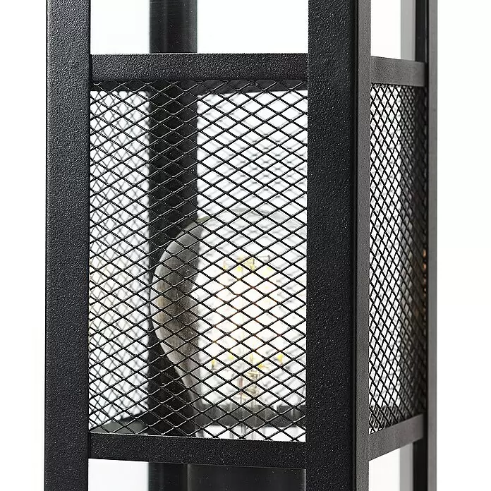 Brilliant Getta Außensockelleuchte - 40 W, Farbe Gehäuse: Schwarz, 10 x 10 x 50 cm, Ohne Leuchtmittel - Nahaufnahme einer schwarzen Metalllaterne mit strukturierter Oberfläche, die ein rautenförmiges Netzgitter und eine beleuchtete Glühbirne im Inneren zeigt.