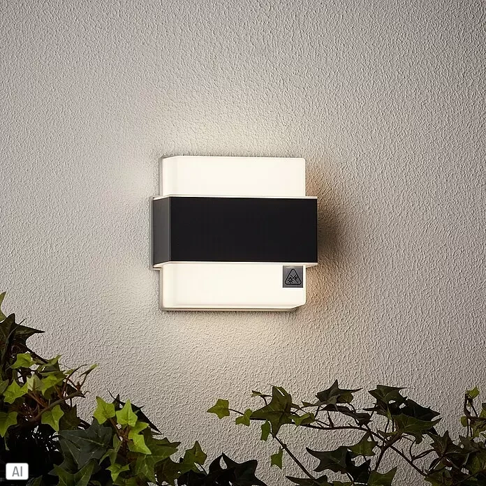 Brilliant LED-Außenwandleuchte Archie - 7 W, L x B x H: 7 x 14,5 x 15 cm, Anthrazit, Neutralweiß - Moderne rechteckige Außenwandleuchte mit schwarzem Mittelband und transluzenten weißen Paneelen, die Licht abgibt.