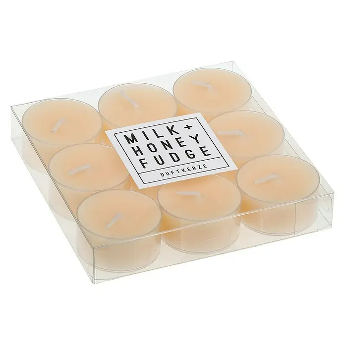 Teelichter Duft - 9 Stk., Milk and Honeyfudge - Eine Packung mit neun Teelichtern "Milk + Honey Fudge Duftkerze" in einer transparenten Plastikverpackung.