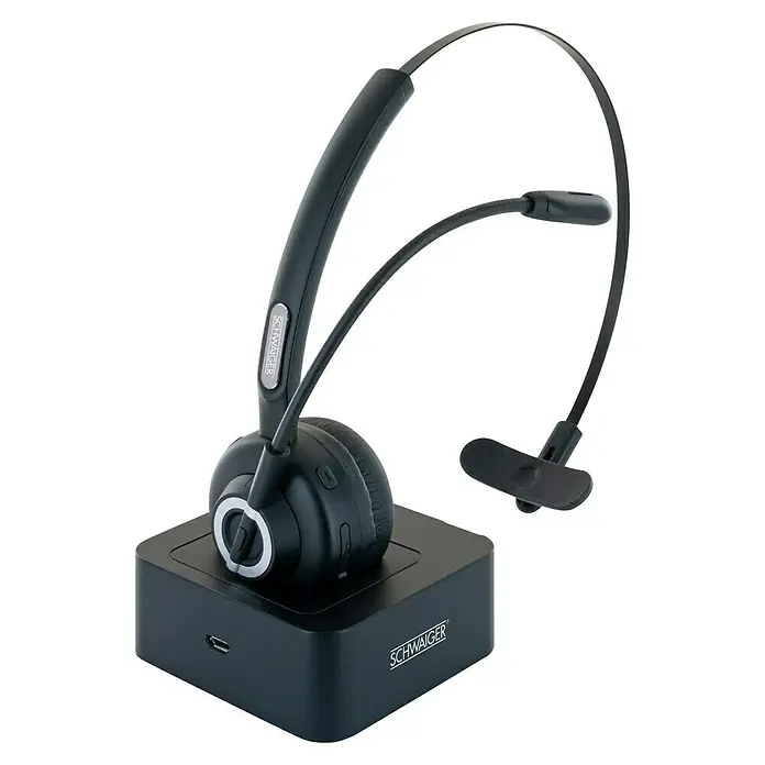 Schwaiger Headset Mono Bluetooth - Schwarz - Nahaufnahme eines schwarzen Schwaiger-Headsets mit Ladestation. Konzipiert für klaren Klang und Komfort bei langen Gesprächen.