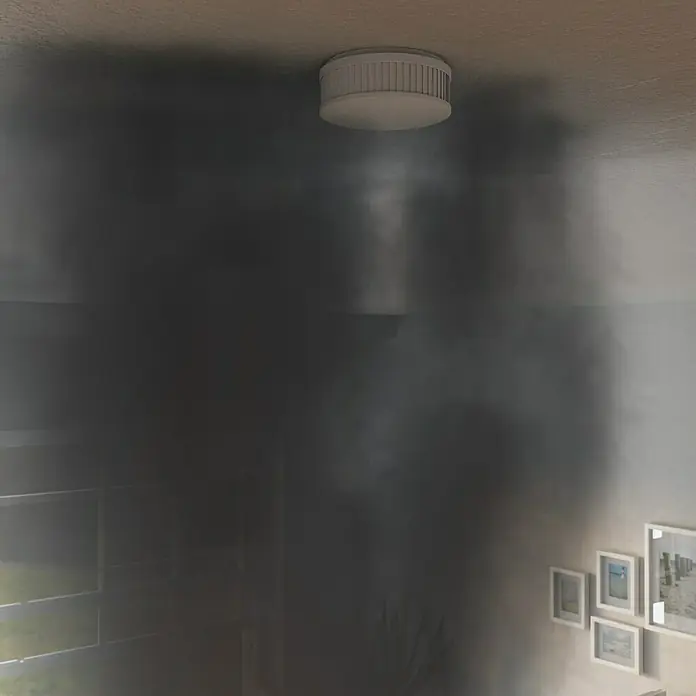 Gloria Rauchwarn- & Hitzemelder PX-1 - Durchmesser: 10,5 cm, Batterielaufzeit: 10 Jahre, Alarmsignal: 85 dB - Das Bild zeigt einen Rauchmelder an einer Decke, umgeben von Rauch, was auf einen möglichen Brand hinweist.