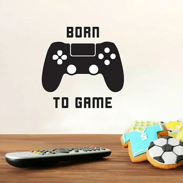 Vinilo de pared Born to game - Negro, Plástico - Vinilo decorativo de pared con el texto "Born To Game" y un diseño de controlador, ideal para habitaciones de jugadores.