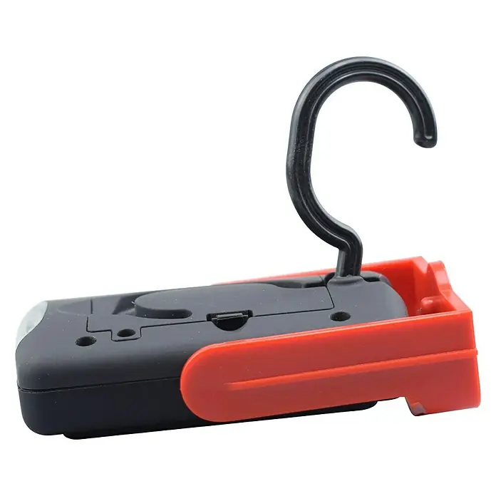 BAUHAUS Mobiles LED-Licht - Schwarz/Rot, Höhe: 97 mm, IP20 - Eine Nahaufnahme einer Werkstattleuchte mit Haken zum Aufhängen und einem roten Gehäuse. Ideal für dunkle Arbeitsbereiche.