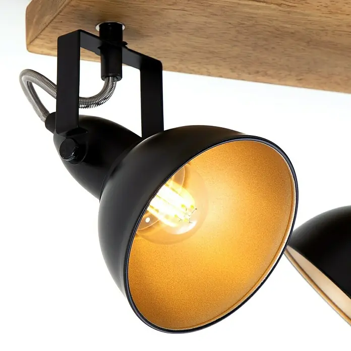 Briloner Barnim Regleta - 50 W, L x An x Al: 28 x 11 x 15,7 cm, Negro/Marrón, Negro/Dorado, E14, 2 ud. - Primer plano de una lámpara de techo con pantalla negra e interior dorado, montada en una viga de madera.