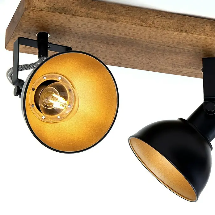 Briloner Barnim Regleta - 75 W, L x An x Al: 50 x 11 x 15,7 cm, Negro/Marrón, Negro/Dorado, E14, 3 ud. - Primer plano de una lámpara de techo negra con dos focos y reflector dorado sobre una tabla de madera.