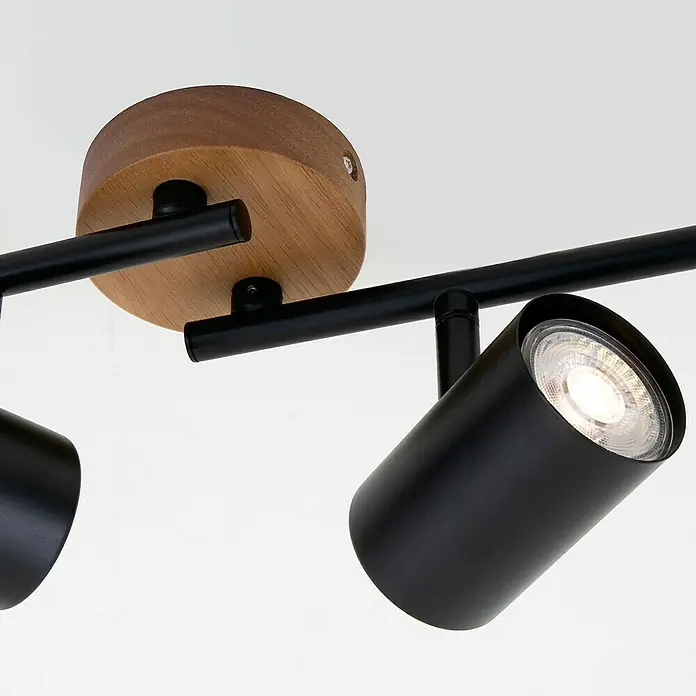 Briloner Muritz Regleta - 140 W, L x An x Al: 68,2 x 9 x 14,5 cm, Negro/Marrón, GU10, 4 ud. - Lámpara de techo con focos de metal negro y elementos de madera, creando una luz cálida.\n