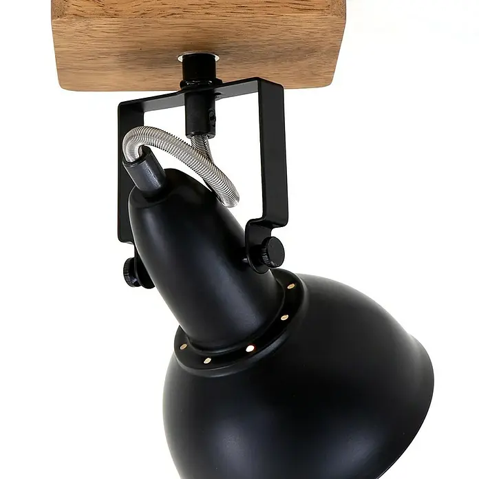 Briloner Barnim Aplique de pared redondo - 25 W, Ø x Al: 11 x 15,5 cm, Negro/Marrón, Negro/Dorado, E14 - Primer plano de un foco negro con base de madera y resorte en espiral, destacando su diseño moderno.