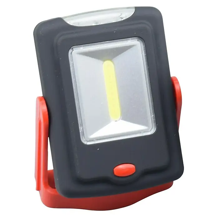 BAUHAUS Mobiles LED-Licht - Schwarz/Rot, Höhe: 97 mm, IP20 - Das Bild zeigt eine tragbare Arbeitsleuchte mit LED-Beleuchtung, ideal für Werkstatt und Hobby.