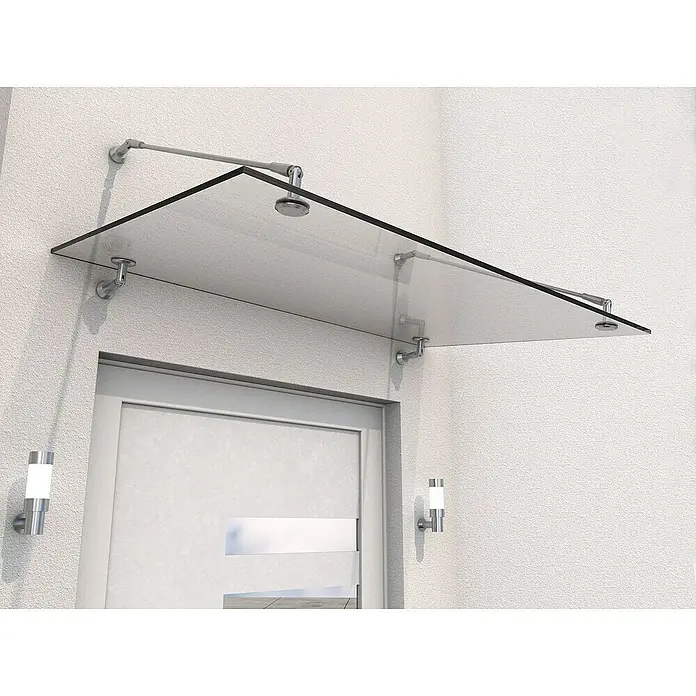 Gutta Vordach PH V2A - 140 x 90 x 40 cm, Edelstahl, Klarglas - Ein modernes Glasvordach mit Stahlhalterungen schützt den Eingangsbereich und verleiht ihm eine elegante Note.