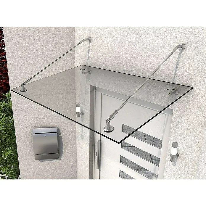Gutta Vordach PH V2A - 140 x 90 x 40 cm, Edelstahl, Klarglas - Vordach aus Glas mit Stahlträgern über einer Haustür, moderne Architektur für den Eingangsbereich. Robust und stilvoll.