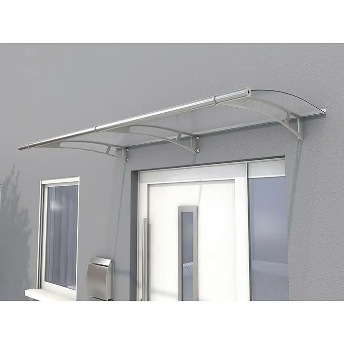 Gutta Pultvordach PT/L - 190 x 95 x 17 cm, Edelstahl, Farbe Dach: Klar - Das Bild zeigt ein modernes Türvordach mit transparentem Dach und silberfarbenen Halterungen, das über einer Haustür montiert ist.