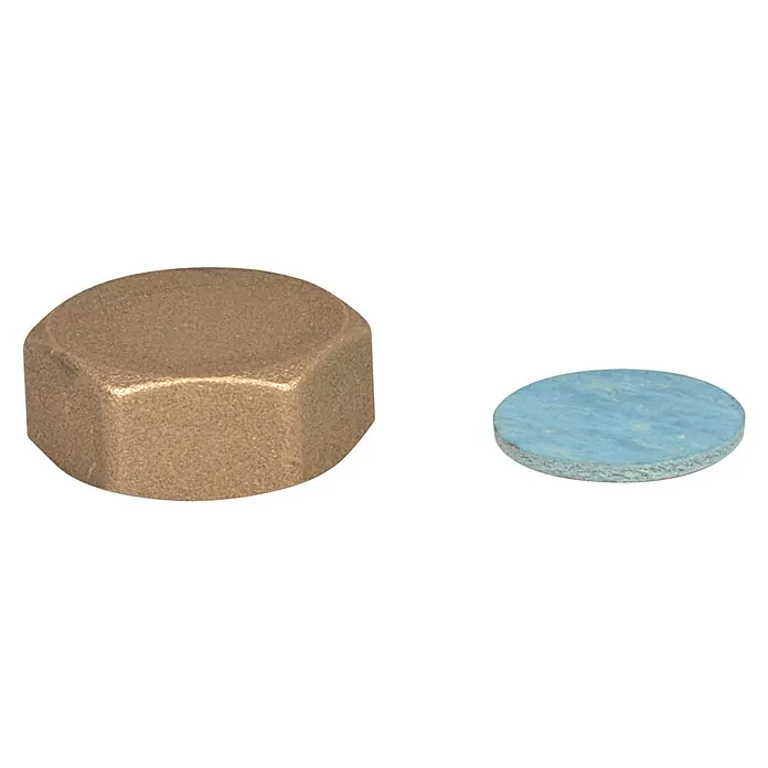 Endkappe - ¾″, Passend für: Verteiler mit 3/4″ - Nahaufnahme einer Messingkappe und einer blauen Dichtung, die typische Komponenten für Sanitär- oder Bauanwendungen darstellen.