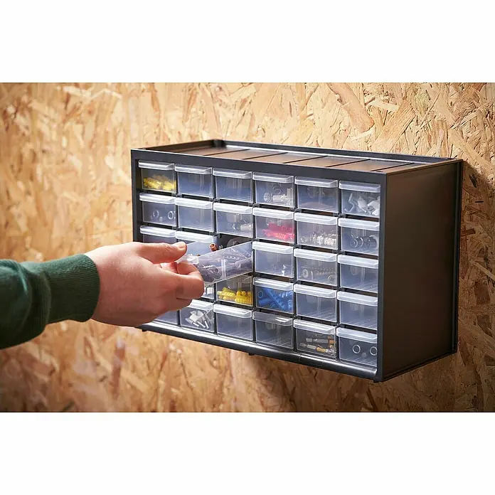 Stanley Kleinteilmagazin - Anzahl Fächer: 30 Stk., Ohne Inhalt - Schubladenschrank zur Aufbewahrung von Kleinteilen. Das Gehäuse ist schwarz und die Schubladen sind transparent.