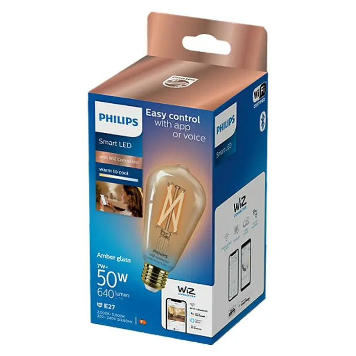 Philips Wiz Smart-LED-Lampe - E27, Dimmbar, Mehrfarbig, 640 lm, 6,7 W - Abbildung der Philips Smart LED-Lampe mit WiZ-Konnektivität im bernsteinfarbenen Glasdesign, gesteuert per App oder Sprachbefehl.