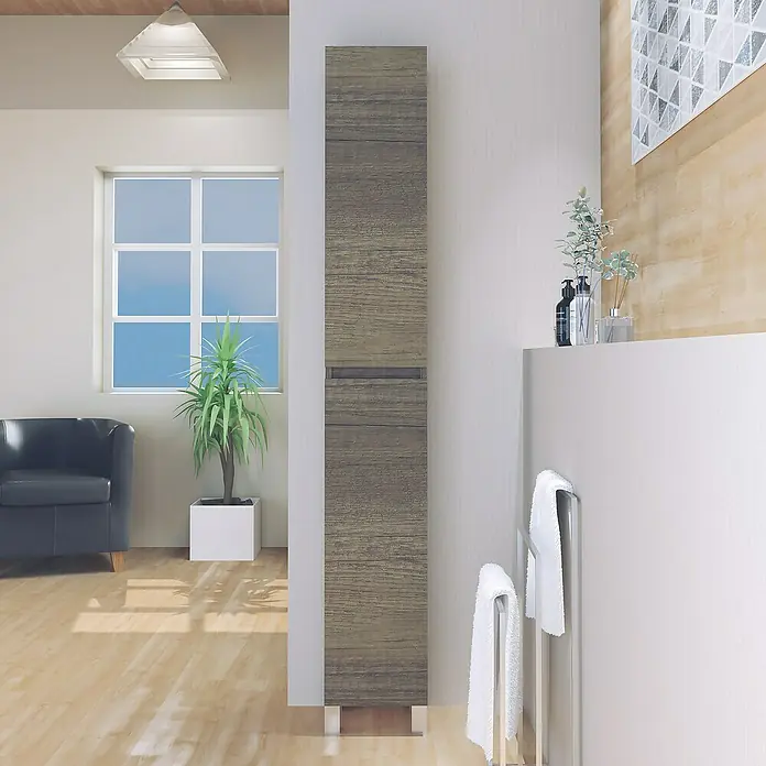 Artysan Armario alto de baño Inca - 24,6 x 26,5 x 173 cm, Nebraska - La imagen muestra un mueble de baño alto con acabado en imitación madera con toallas. El mueble tiene un aspecto moderno.