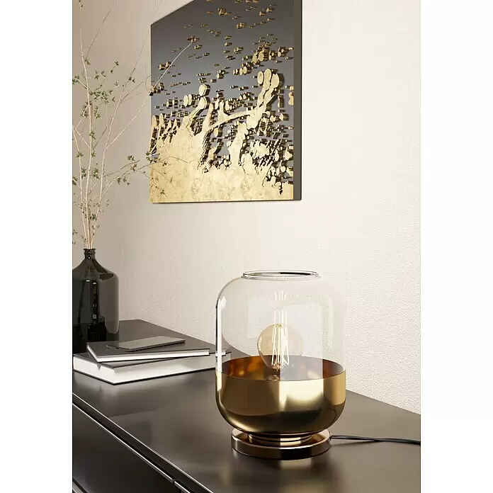 Eglo Maryvilla Tischleuchte - 40 W, Brüniert, E27 - Moderne Tischlampe mit klarem Glasschirm und goldenem Fuß, auf dunkler Oberfläche in zeitgemäßem Raumambiente.
