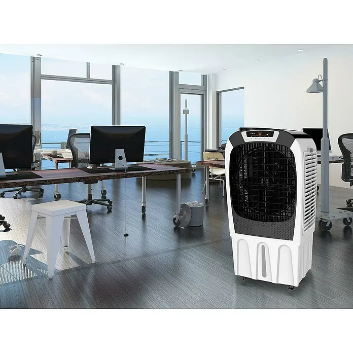 Purline Rafy Aire acondicionado portátil 195 - 450 W, Blanco/Negro - Interior de oficina con un enfriador de aire portátil blanco y negro, centrado en la comodidad.