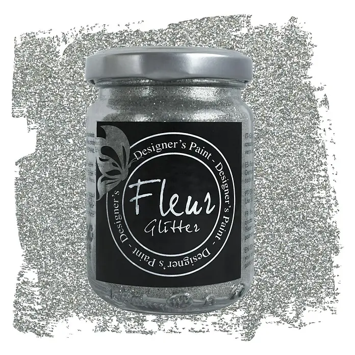 Fleur Purpurina Glitter - Plateado, 90 g, Brillante - Primer plano de un bote de pintura de diseño Fleur Glitter, ideal para manualidades y para decorar diversas superficies con purpurina.