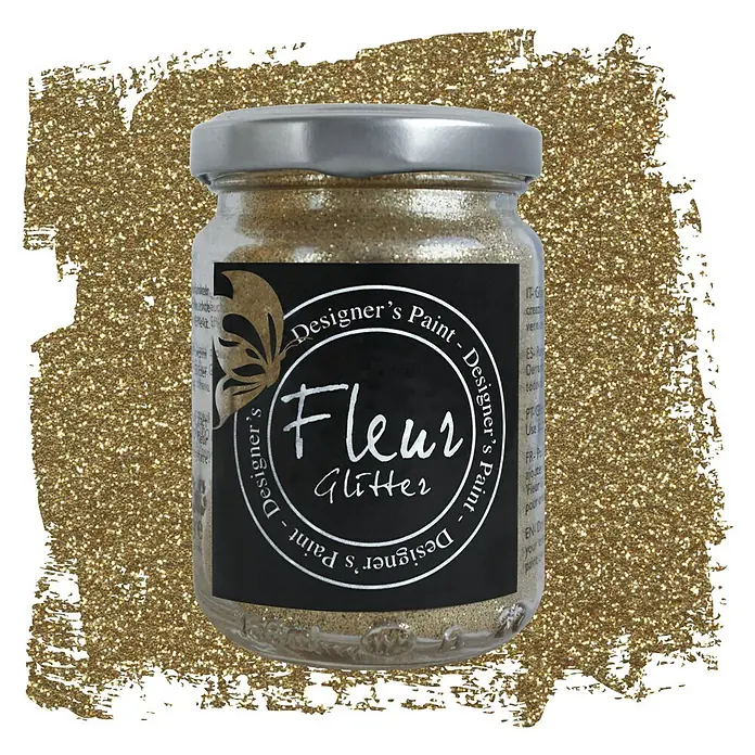 Fleur Purpurina Glitter - Champagne, 90 g, Brillante - Tarro de pintura dorada con purpurina Fleur Designer, rodeado de un fondo de purpurina dorada para proyectos creativos.