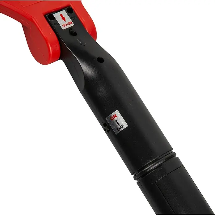 Windhager Elektrische Fliegenklatsche ACCU COMFORT - Fliegen, L x B x H: 40,5 x 21,5 x 4,8 cm - Nahaufnahme des schwarzen Griffs eines Werkzeugs mit einem roten Knopf und Schaltern für Verriegelung und Ein-/Ausschalten.