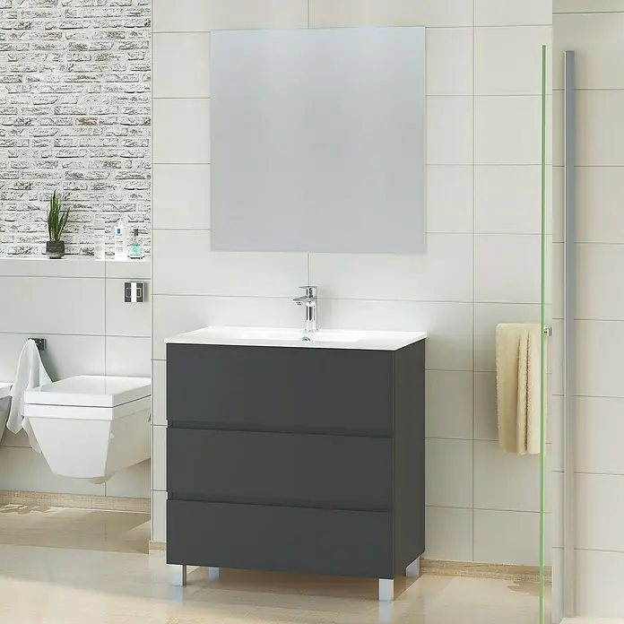 Artysan Mueble de lavabo Patri - 46 x 80 x 85 cm, Negro - Imagen de un baño moderno con un tocador gris con tres cajones, un lavabo blanco y un espejo cuadrado.
