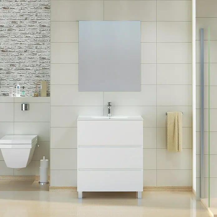 Artysan Mueble de lavabo Patri - 46 x 70 x 85 cm, Blanco mate - Un baño moderno con un tocador blanco con cajones, un espejo y un inodoro contra una pared con efecto ladrillo.