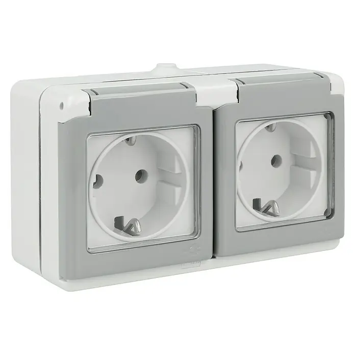 Voltomat FLUID Feuchtraum-Steckdose - Horizontal, 2-fach, Grau, IP44 - Doppelte Schutzkontakt-Steckdose mit Klappdeckel, ideal für den Einsatz in feuchten Umgebungen und im Außenbereich. Robuste Ausführung in Grau und Weiß.