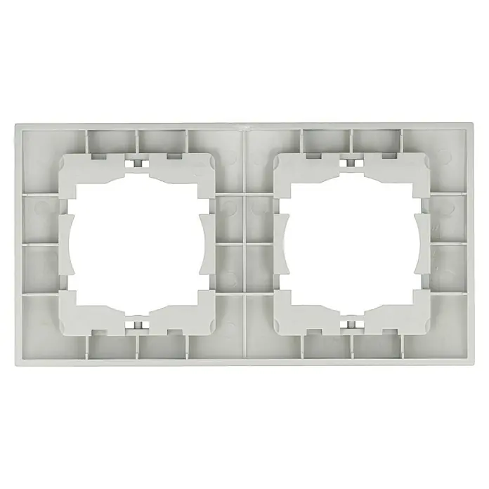 Voltomat DEA 100 Abdeckrahmen - Alu/Silber, 2-fach, Kunststoff, Vertikal - Nahaufnahme einer weißen Doppel-Wandhalterung, die zur Installation von zwei Schaltern oder Steckdosen verwendet wird. Robuster Rahmen mit Aussparungen.