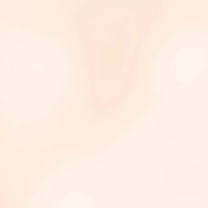 Fleur Pigmento concentrado Polvo metálico - Rosa perla, 5 g - Un fondo borroso y suave en un tono melocotón claro y suave, perfecto para diseños gráficos o superposiciones sutiles.