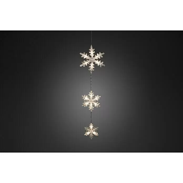 Konstsmide LED-Lichtervorhang Schneeflocken - Außen, 3,67 m, Warmweiß, 15 Stk., Batteriebetrieben - Drei klare, beleuchtete Schneeflocken-Dekorationen hängen vertikal.