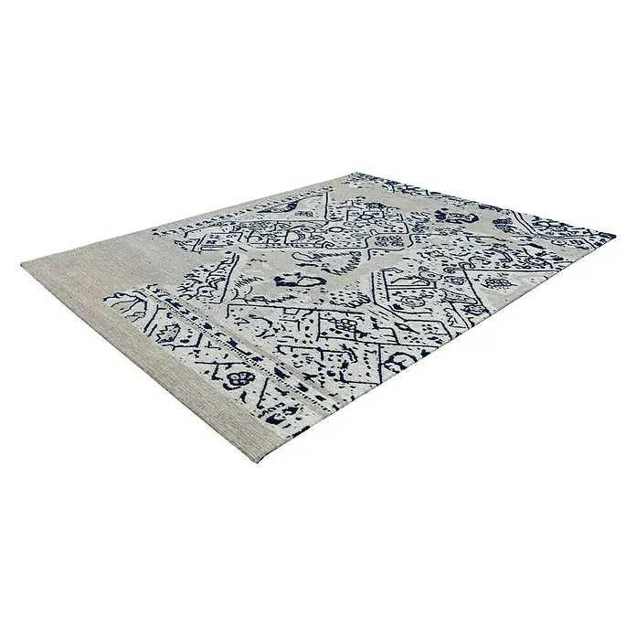 Kayoom Flachgewebeteppich River 120 - Grau/Schwarz, 170 x 120 cm, 70 % Baumwolle, 30 % Polyester - Ein Teppich mit blauem Muster auf beigem Grund. Dieser Teppich ist ein echter Hingucker und verleiht jedem Raum eine besondere Note.