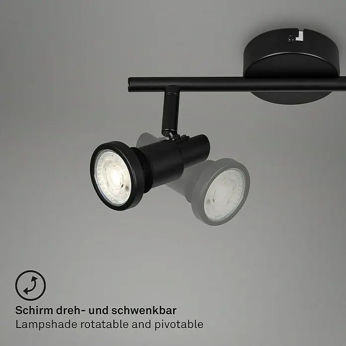 Briloner LED-Deckenstrahler - 4,8 W, L x B x H: 27,5 x 8 x 12,3 cm, Schwarz, Warmweiß, 2 Stk. - Nahaufnahme einer schwarzen, schwenkbaren Lampenleiste mit zwei LED-Strahlern vor grauem Hintergrund.