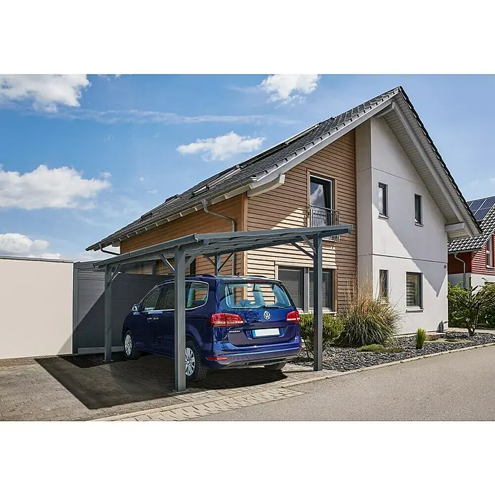 Carport Andy - Außenmaß inkl. Dachüberstand (B x T): 498 x 294 cm, Einzelcarport, Anthrazit - Ein modernes Carport schützt ein blaues Auto vor dem Haus. Das Carport bietet einen sicheren und stilvollen Unterstand für Fahrzeuge.