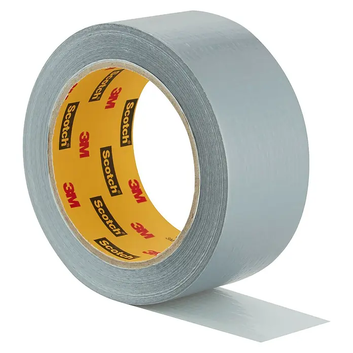 3M Cinta adhesiva universal Scotch americana - Gris, An x L: 48 mm x 25 m, 1 ud. - Primer plano de un rollo de cinta adhesiva gris Scotch sobre una superficie negra. Ideal para reparaciones y proyectos de bricolaje.