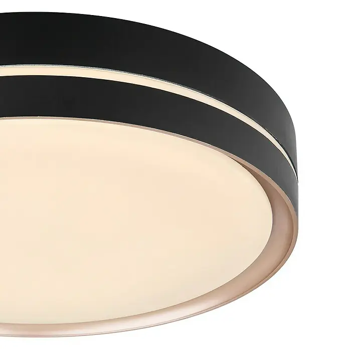 Globo LED-Deckenleuchte rund MANNI24 W, Ø x H: 38,5 x 8 cm, Schwarz, Warmweiß - Nahaufnahme einer modernen, runden Deckenleuchte mit schwarzem Rand und einem hellen, diffusen Licht. Perfekt für stilvolle Innenräume.