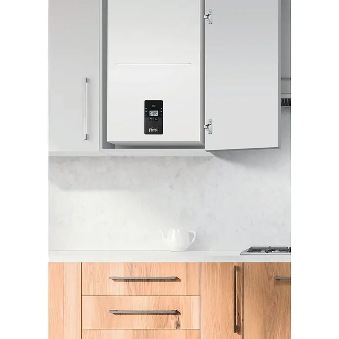Ferroli Caldera BlueHelix Alpha 24C con instalación incluida - 20,6 kW, 8 l, Display multifunción - Primer plano de una caldera Ferroli instalada en un moderno mueble de cocina, que muestra un sistema de calefacción elegante y eficiente.