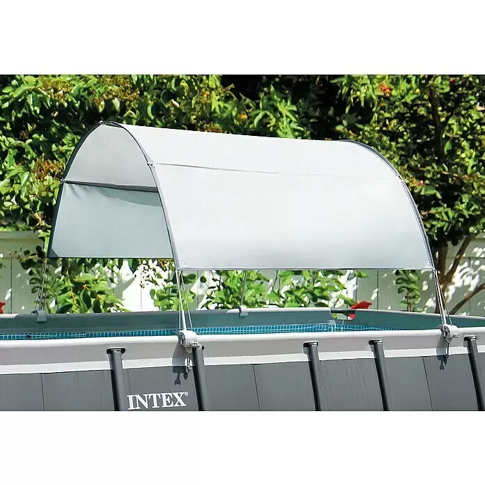 Intex Poolüberdachung - Geeignet für: Frame Pool - Ein hellgraues, gewölbtes Sonnendach spendet Schatten über einem Intex Aufstellpool.