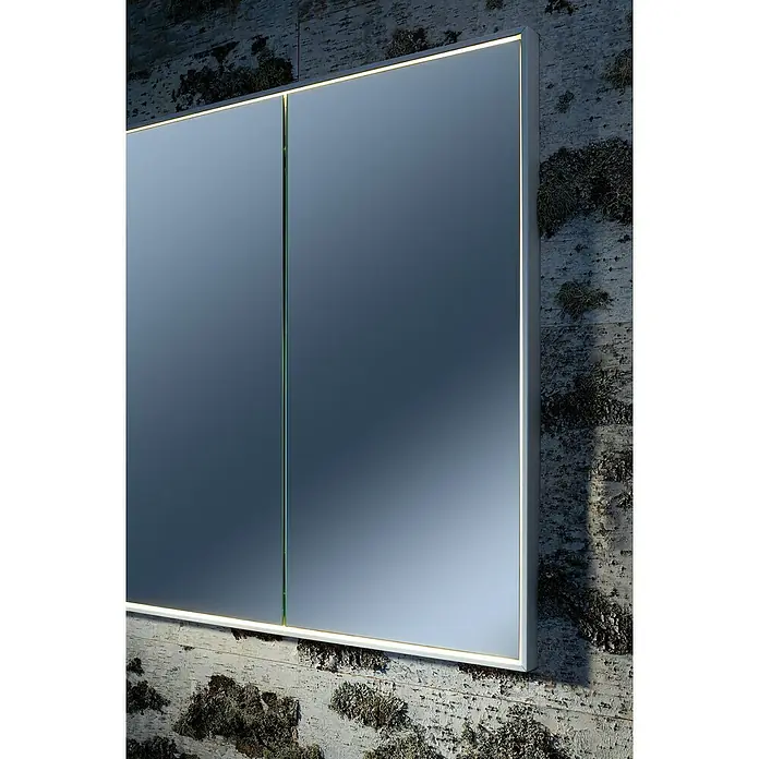 Lanzet Dune LED-Spiegelschrank - B x H: 101,8 x 70,2 cm, Holz, Schwarz - Nahaufnahme eines modernen Spiegelschranks mit LED-Beleuchtung und schlichtem Design an einer strukturierten Wand.