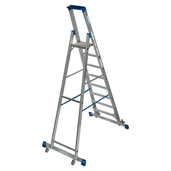 Krause Stabilo Stehleiter Fahrbar mit Traverse - Anzahl Tritte: 8 Stk., Arbeitshöhe: 3,9 m, Aluminium - Das Bild zeigt eine rollbare, freistehende Arbeitsplattform von Krause mit einem Geländer und einer Stufe, ideal für sicheres Arbeiten in der Höhe.