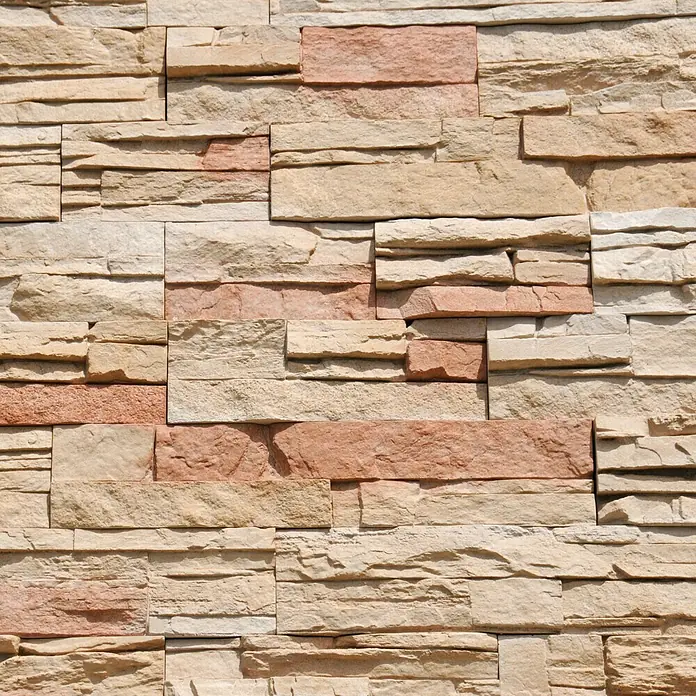 Revestimiento de piedra Petra Agata - Cantidad total: 4 pzs., Agata - Primer plano de una pared con revestimientos de piedra decorativos en tonos beige y rosa, creando una textura rústica y cálida.