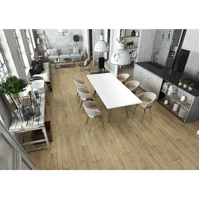 LOGOCLIC Laminado Roble Palermo - 1.375 x 188 x 12 mm, Roble Palermo, AC5 - Imagen interior de un comedor con una mesa blanca y sillas claras, complementado con detalles grises en la decoración.