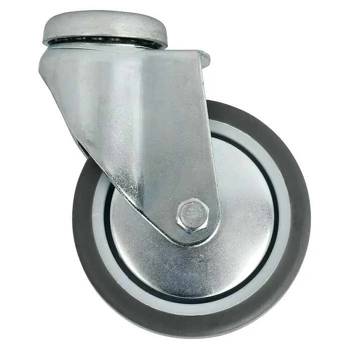 Stabilit Apparate-Lenkrolle - Durchmesser Rollen: 75 mm, Traglast: 50 kg, Gleitlager, Mit Rückenloch - Nahaufnahme eines Lenkrollen-Möbelrades mit grauem Gummirad und Metallhalterung vor schwarzem Hintergrund.