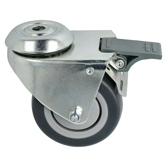 Dörner & Helmer Apparate-Doppelrolle - Durchmesser Rollen: 75 mm, Traglast: 100 kg, Gleitlager, Mit Rückenloch und Feststeller - Eine Nahaufnahme eines Lenkrolle mit Bremse, die für Möbel oder Geräte geeignet ist. Das Gehäuse ist aus Metall, das Rad aus Gummi.